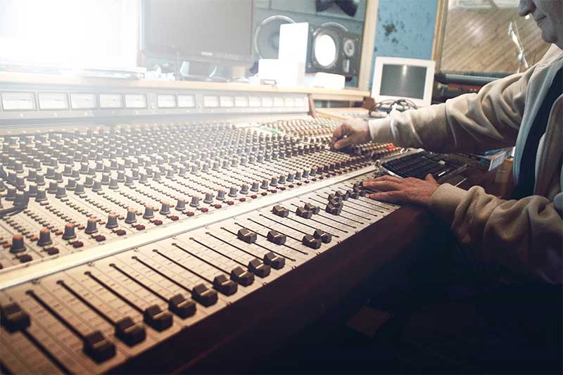 Sound engineer working at a recording studio